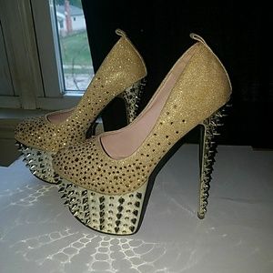Gold spiky stillettos